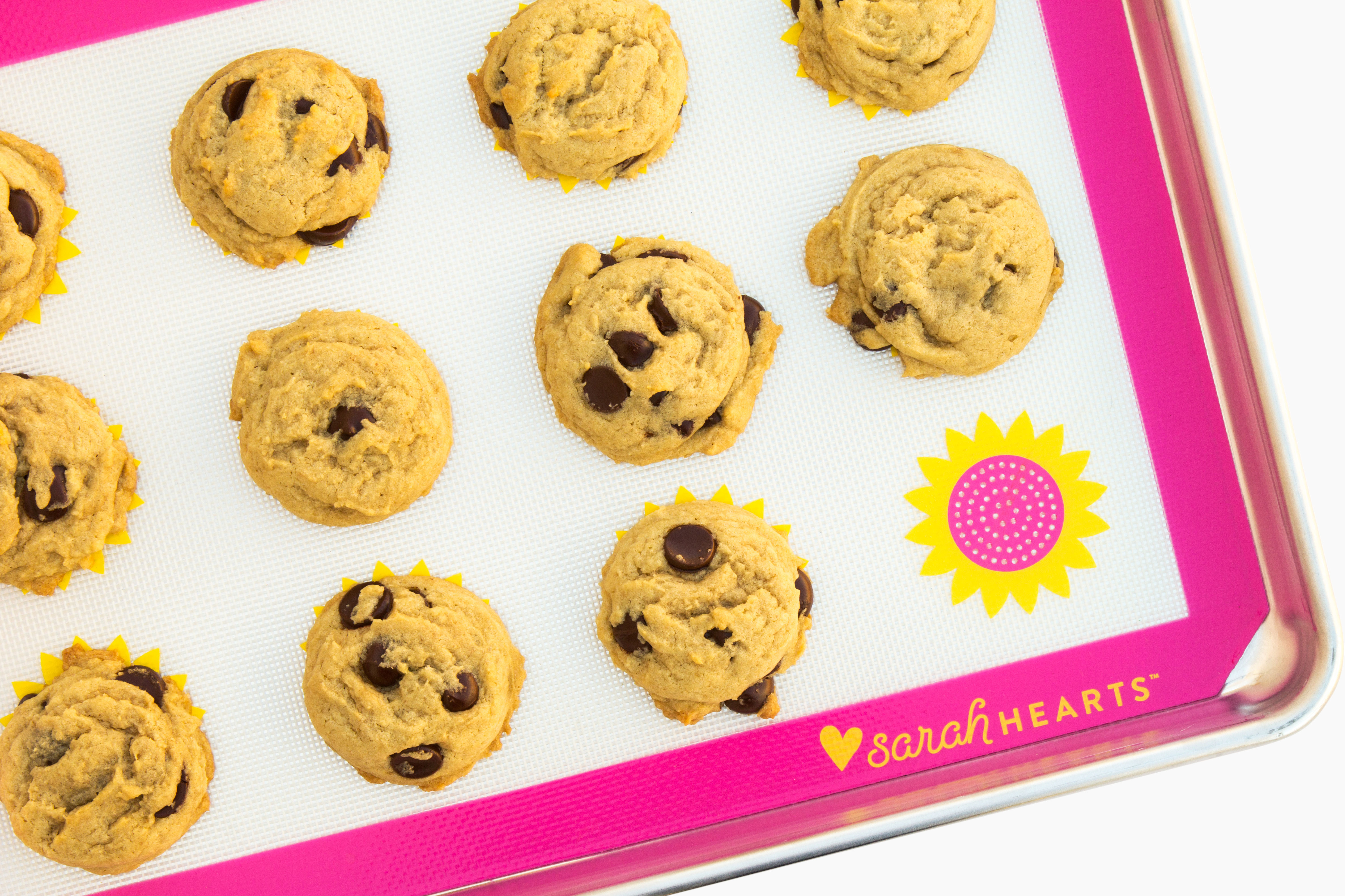 Pink and yellow sunflower non-stick silicone baking mat by Sarah Hearts